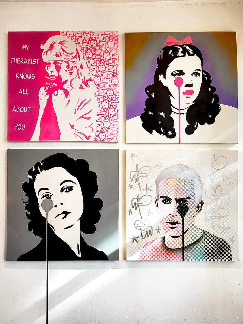 Pop art style portraits displayed at Pure Evil Gallery in Shoreditch London