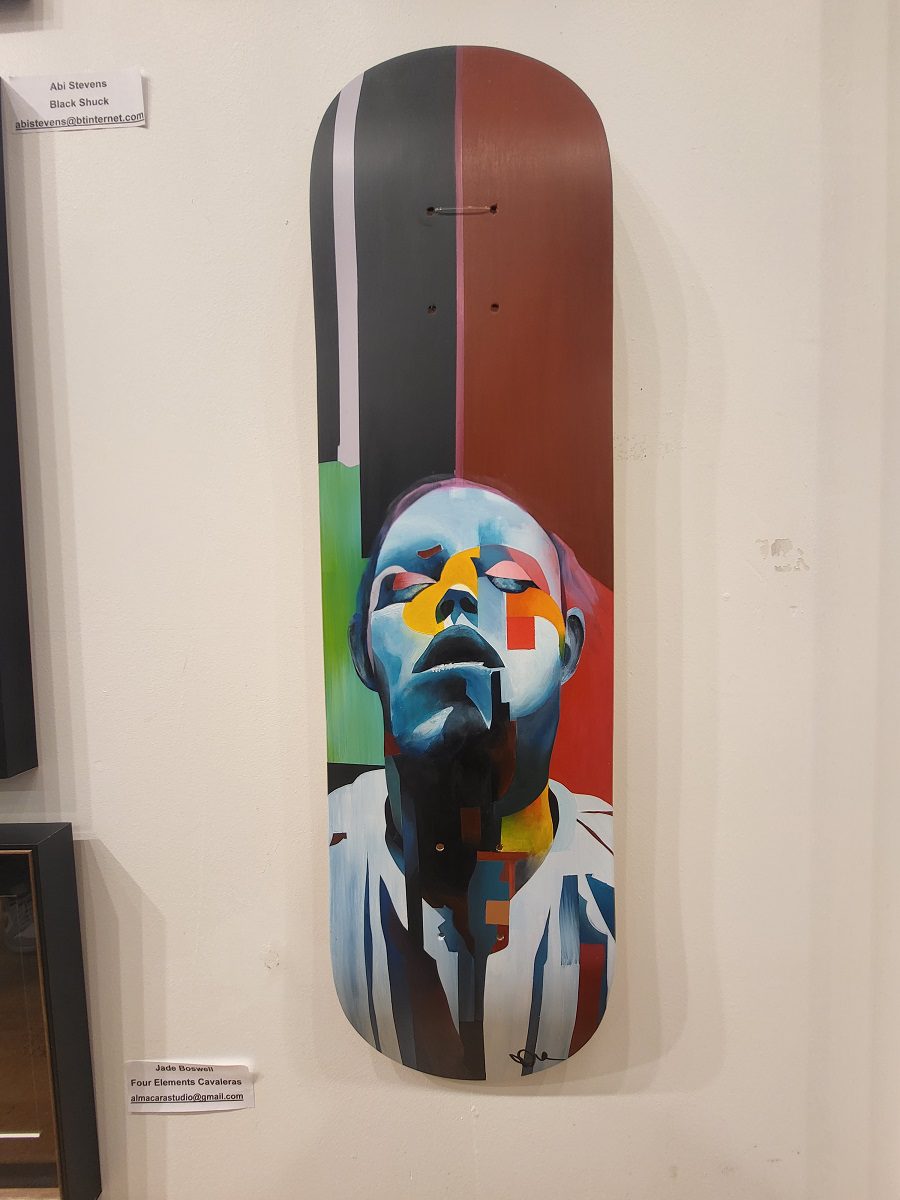 My hand painted skateboard deck on display as part of the Shine exhibition Hand painted skateboard deck by Paul Kneen