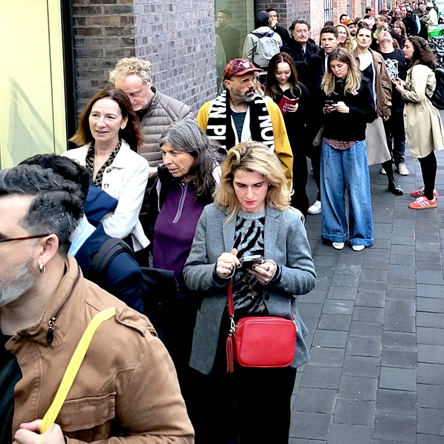 lots of people queuing to get into the Triple Trouble exhibition