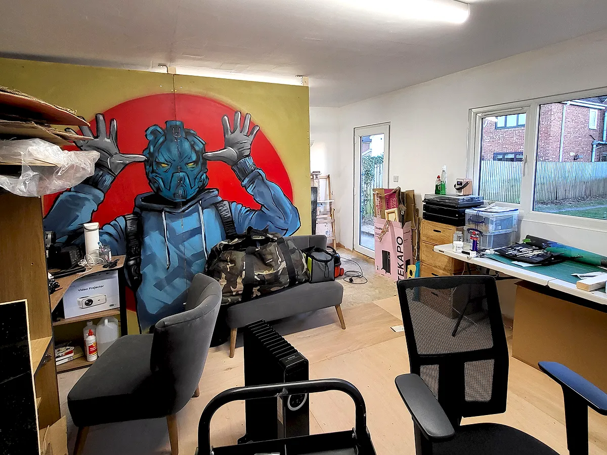 Interior of garden art studio with easel and acrylic painting workspace