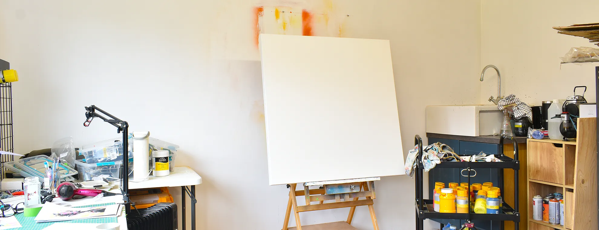 Blank canvas in artist Paul Kneen's studio before starting a new abstract portrait painting