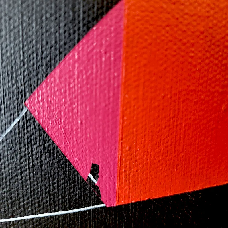 Close-up of a masked geometric section of Paul Kneen's painting where a small area of acrylic lifted as the masking tape was removed. Small area of acrylic paint lifted from the edge of a masked geometric shape